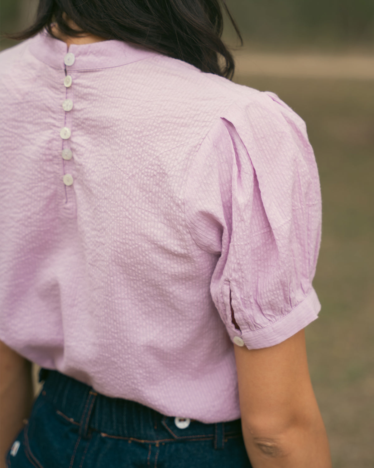vintage inspired women’s blouse with button back details and soft cotton fabric